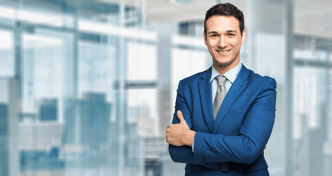 Man in a suit smiling